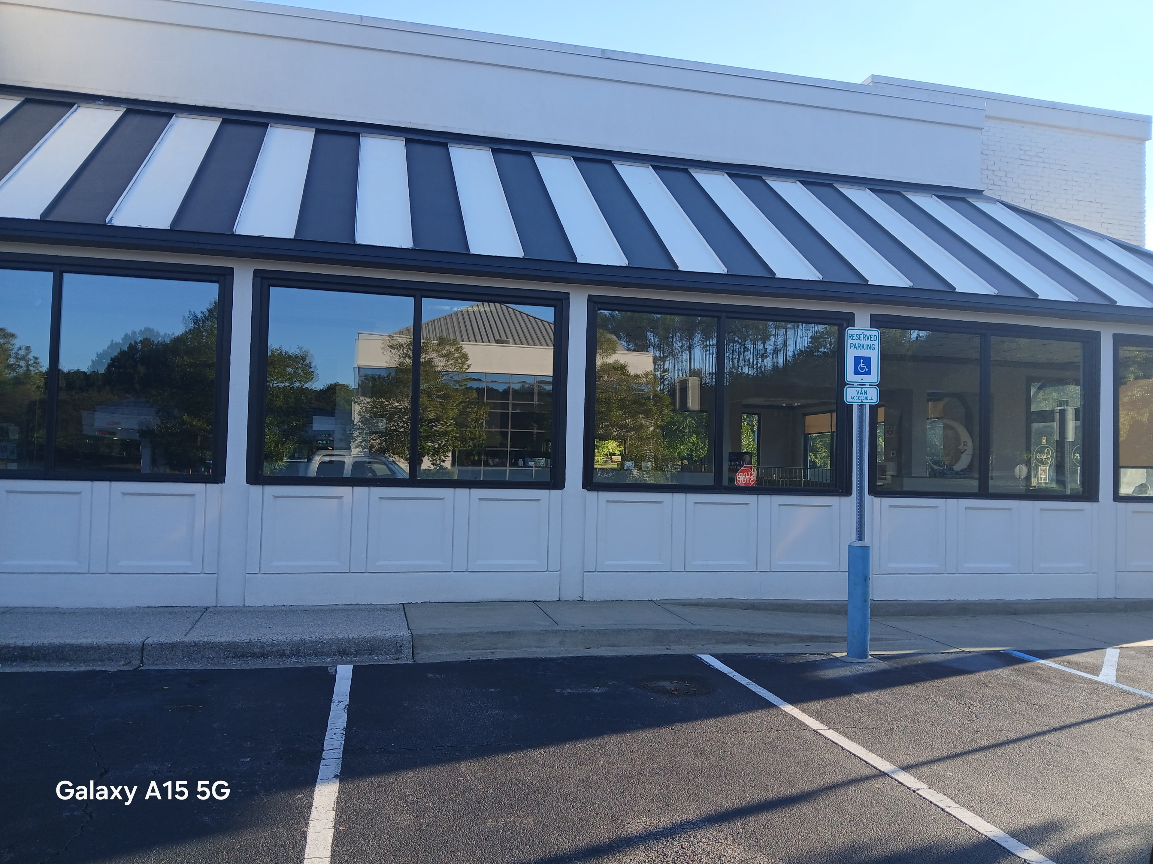 Project photo 1: Birmingham Retail Storefront — Avery Dennison Facade Graphics