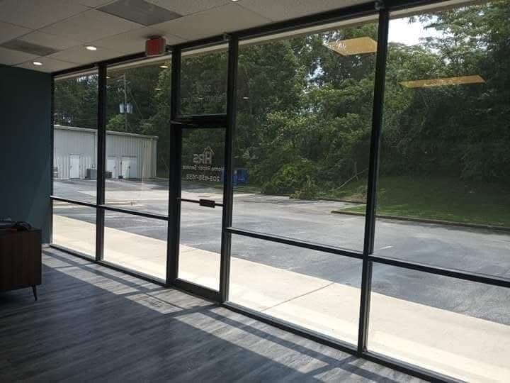 Project photo 1: Pelham US-31 Retail Strip — Solar Control & Safety Film